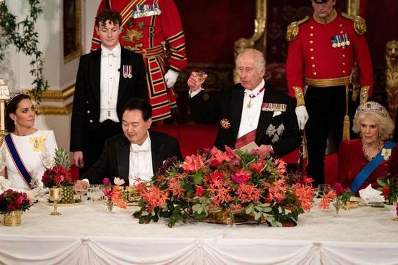 South Korean President state visit to the UK President of South Korea Yoon Suk Yeol listens as King Charles III speaks at the state banquet at Buckingham Palace, London, for the state visit to the UK ...