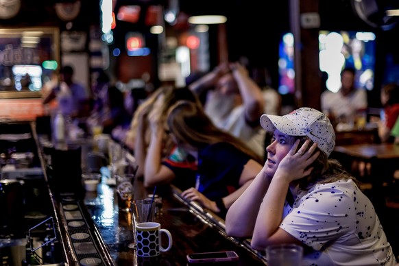 epa10787517 Team USA fans react to the USA loss to Sweden in the penalty shoot-out while watching the FIFA Women&#039;s World Cup 2023 Round of 16 soccer match between Sweden and the USA at the Brewho ...