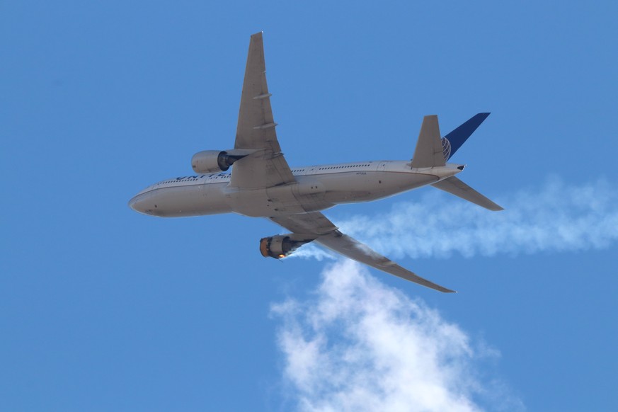 epa09028759 A photo provided by Instagram user Hayden Smith (speedbird5280) shows United Airlines flight 328 (Boeing 777-200, tailnumber N772UA) with an engine on fire, near Denver, Colorado, USA, 20  ...