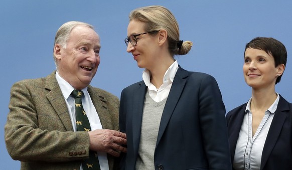 Frauke Petry, co-chairwoman of the AfD, right, stands with top candidates Alexander Gauland, left, and Alice Weidel, center, prior to a press conference of the Alternative for Germany, AfD, in Berlin, ...