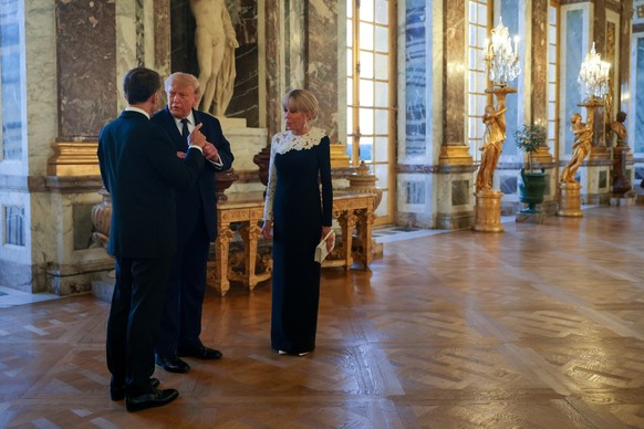 President Donald Trump receives a tour of Chateau de Versailles from President of France Emmanuel Macron and his wife Brigitte Macron ahead of a dinner on Wednesday, June 17, 2026 in Versailles, Franc ...