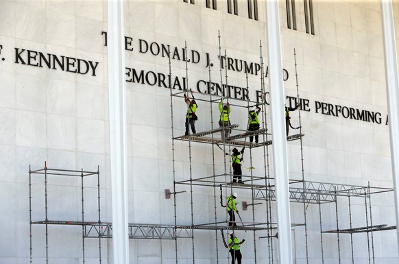 Workers construct scaffolding below the John F. Kennedy Center for the Performing Arts sign Friday, June 12, 2026, in Washington. (AP Photo/Rahmat Gul)
Trump Kennedy Center