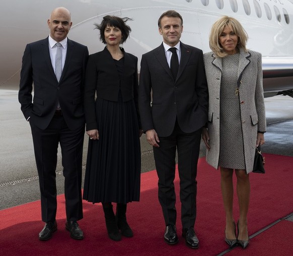 Switzerland President Alain Berset, and Switzerland&#039;s First Lady Muriel Zeender Berset welcome French President Emmanuel Macron and his wife and France&#039;s First Lady Brigitte Macron, from lef ...