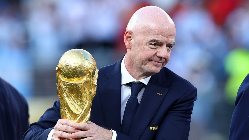 EAST RUTHERFORD, NEW JERSEY - JULY 19: FIFA President Gianni Infantino holds the trophy at full-time following the FIFA World Cup 2026 Final match between Spain and Argentina at New York New Jersey St ...
