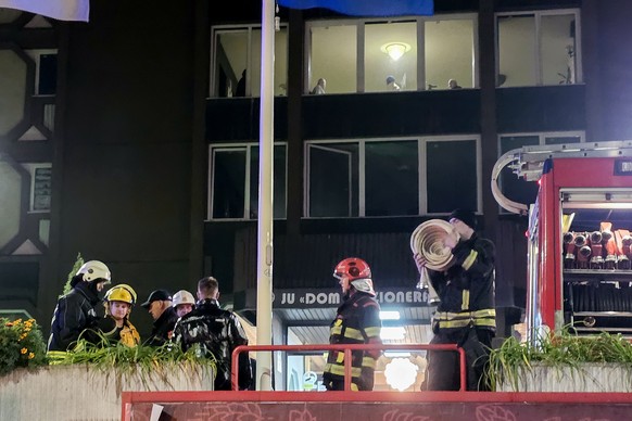 Firefighters stand guard in front of a nursing home after a fire in Tuzla, Bosnia, Tuesday, Nov. 4, 2025. (AP Photo)
Bosnia Nursing Home Fire