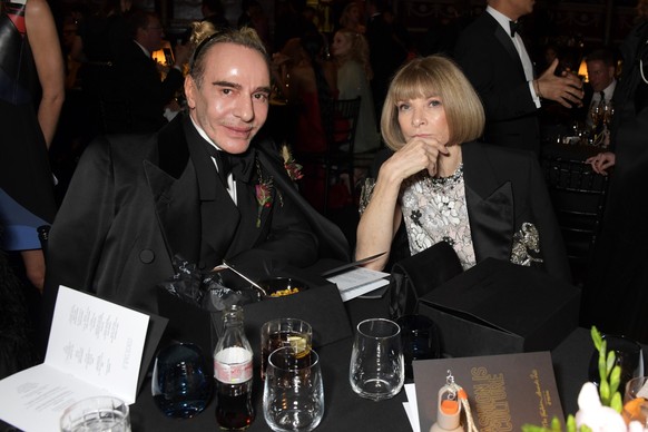 LONDON, ENGLAND - NOVEMBER 29: John Galliano and Editor-In-Chief of American Vogue and Chief Content Officer of Conde Nast Dame Anna Wintour attend a cocktail reception ahead of The Fashion Awards 202 ...