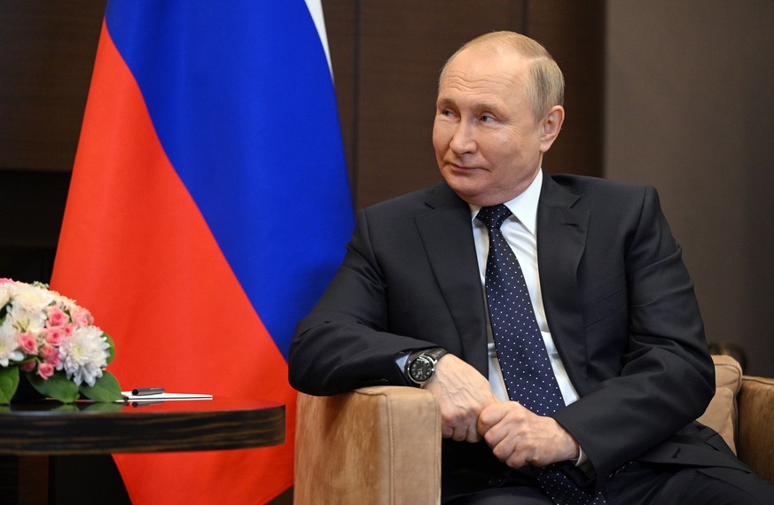 epa09969172 Russian President Vladimir Putin attends a meeting with Belarusian President Alexander Lukashenko (not pictured) at the Bocharov Ruchei residence in the resort city of Sochi, Russia, 23 Ma ...