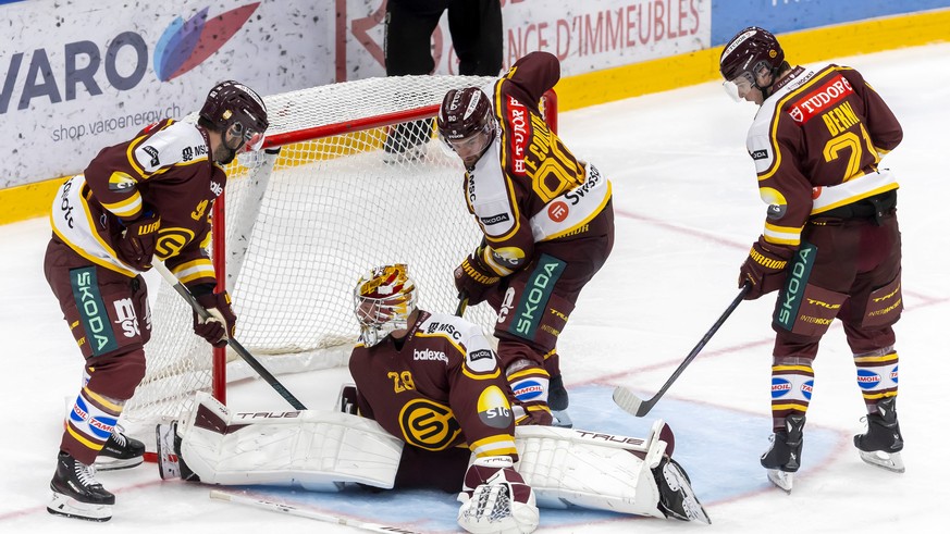 Tim Bozon (GSHC) #94, goaltender Robert Mayer (GSHC) #29, Simon Le Coultre (GSHC) #90 and Tim Berni (GSHC) #21, in action, during a National League regular season game of the Swiss Championship betwee ...