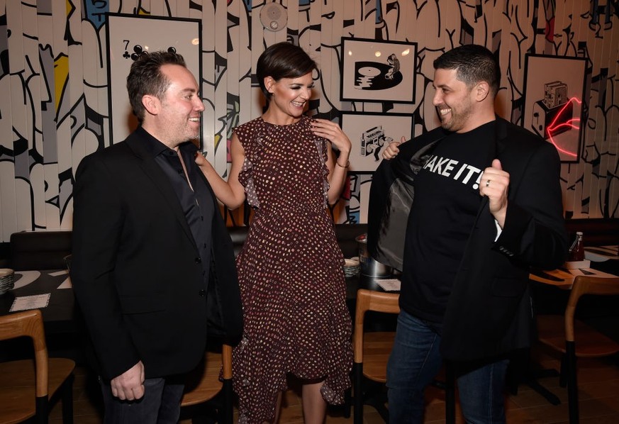 LAS VEGAS, NV - DECEMBER 29: (L-R) Co-owner Chris Barish, actress Katie Holmes and co-owner Joe Isidori attend the grand opening of Black Tap Craft Burgers &amp; Beer at The Venetian Las Vegas on Dece ...