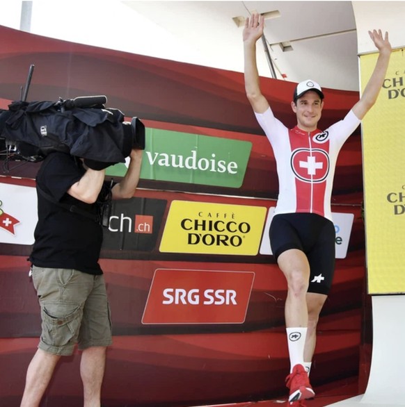 Sous les feux de la rampe : Imhof lors d'une cérémonie de remise de prix au Tour de Suisse.