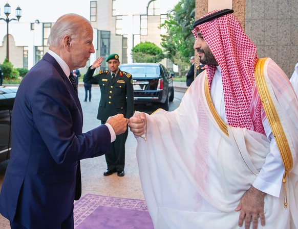 CORRECTS SOURCE TO SAUDI ROYAL PALACE, NOT SAUDI PRESS AGENCY (SPA), ADDS BYLINE - In this image released by the Saudi Royal Palace, Saudi Crown Prince Mohammed bin Salman, right, greets President Joe ...
