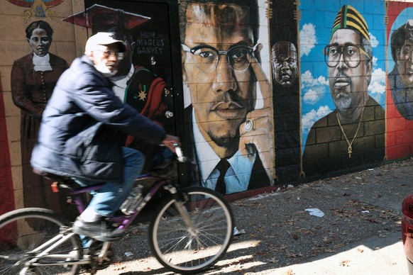 NEW YORK, NEW YORK - NOVEMBER 18: A picture of Malcolm X is included in a Brooklyn mural of iconic civil rights leaders on November 18, 2021 in New York City. In a Manhattan court room, Muhammad Aziz  ...