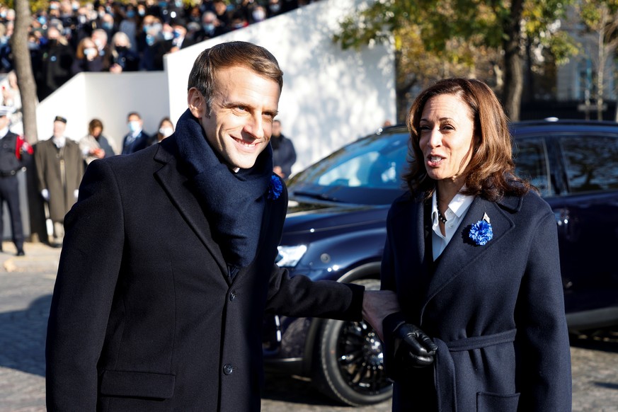 French President Emmanuel Macron welcomes Vice President Kamala Harris before the ceremony marking the 103rd anniversary of Armistice Day, Thursday, Nov. 11, 2021 in Paris. (Ludovic Marin, Pool via AP ...