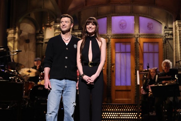 SATURDAY NIGHT LIVE -- Episode 1854 -- Pictured: (l-r) Musical guest Justin Timberlake and host Dakota Johnson during the Monologue Saturday, January 27, 2024 -- (Photo by: Will Heath/NBC via Getty Im ...