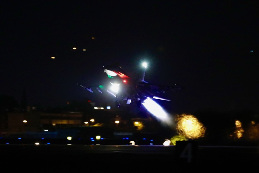 Taiwan Air Force F-16v jets conduct an evening take off as part of a combat readiness mission, inside an airbase in Hualien, Taiwan, 17 August 2022.