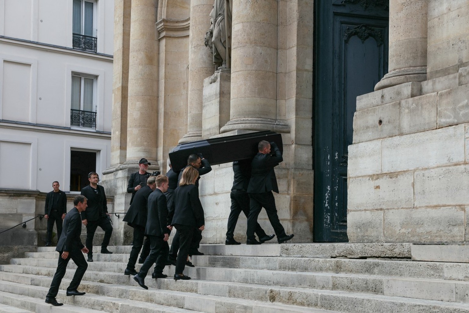 Pallbearers carry the coffin of late French TV host Thierry Ardisson during his funeral at Saint-Roch Church in Paris on July 17, 2025. Host and producer Thierry Ardisson, the French TV star nicknamed