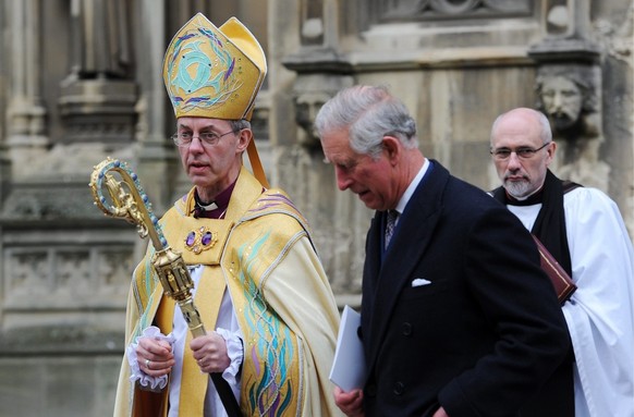 epa03634637 Archbishop of Canterbury Justin Welby (L) walks with Britain&#039;s Prince Charles following the former&#039;s inauguration at Canterbury Cathedral in Canterbury, Kent, south east England  ...