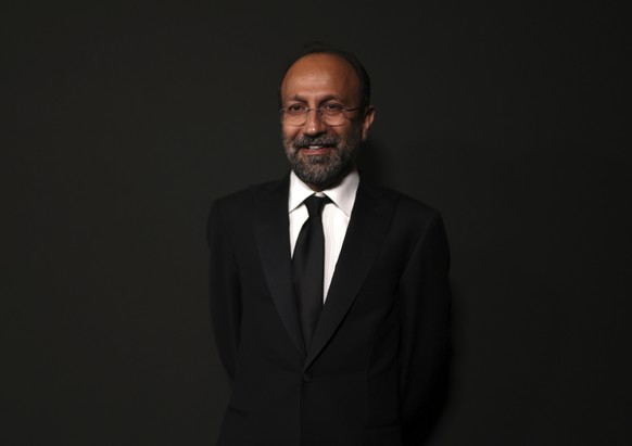 Asghar Farhadi poses for photographers upon arrival at the Women in Motion Awards during the 75th international film festival, Cannes, southern France, Sunday, May 22, 2022. (Photo by Vianney Le Caer/ ...
