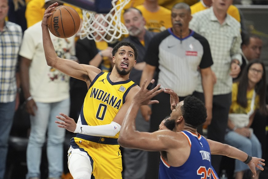 Indiana Pacers guard Tyrese Haliburton (0) shoots during the second half of Game 6 of the Eastern Conference finals of the NBA basketball playoffs against the New York Knicks in Indianapolis, Saturday ...
