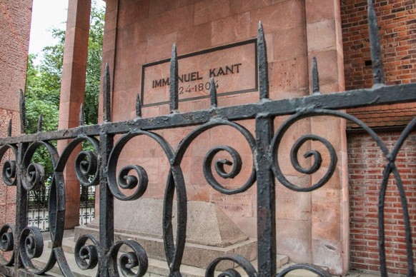 Tomb of Immanuel Kant outside the Cathedral of our lady and St. Adalbert (Konigsberger Dom - Knigsberg Cathedral) on the Kant Island is seen in Kaliningrad Russia on 7 September 2019 (Photo by Michal  ...