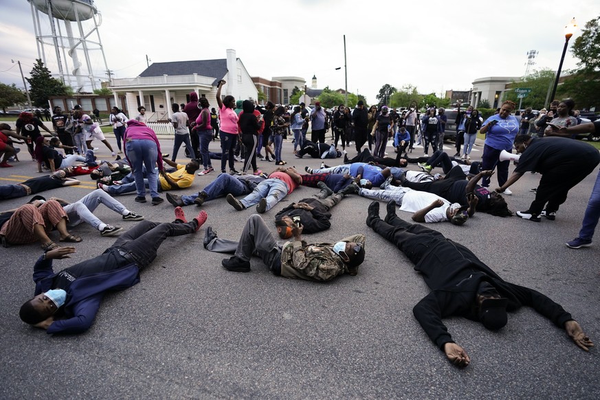 People block an intersection after at least one Pasquotank County Sheriff&#039;s deputy shot and killed a Black man, Andrew Brown Jr., while executing a search warrant, the sheriff&#039;s office said, ...
