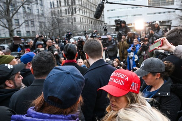 NEW YORK, NEW YORK - MARCH 20: Supporters of former President Donald Trump protest near the office of Manhattan District Attorney Alvin Brag and the New York County Criminal Court on March 20, 2023 in ...