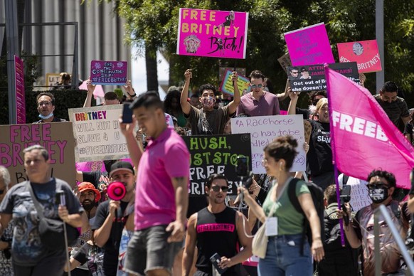 epa09297665 Hundreds of demonstrators rally during a #FREEBRITNEY protest in front of the court house where Britney Spears addresses the court in conservatorship hearing in Los Angeles, California, US ...