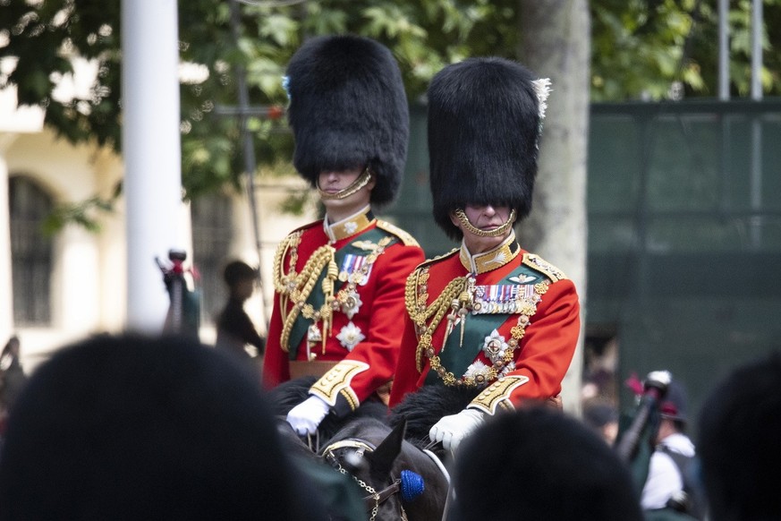 Britain&#039;s Prince Charles (L), The Prince of Wales, with Prince William (R), the Duke of Cambridge ride on horseback during the Platinum Jubilee celebrations for Britain&#039;s Queen Elizabeth II, ...