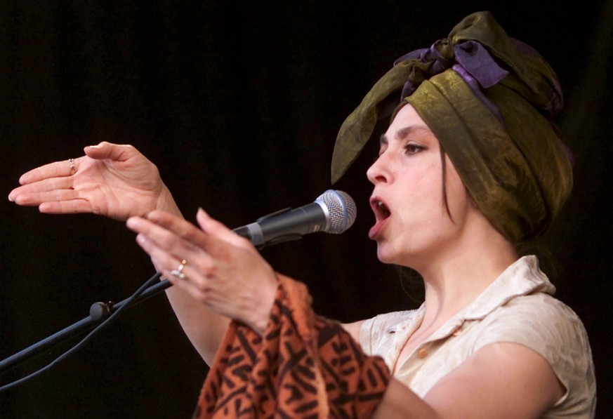 French singer Catherine Ringier from Les Rita Mitsouko performs on the stage at the second day of the Paleo Festival, in Nyon, Switzerland, on Wednesday, July 26, 2000. More than 220'000 spectato ...