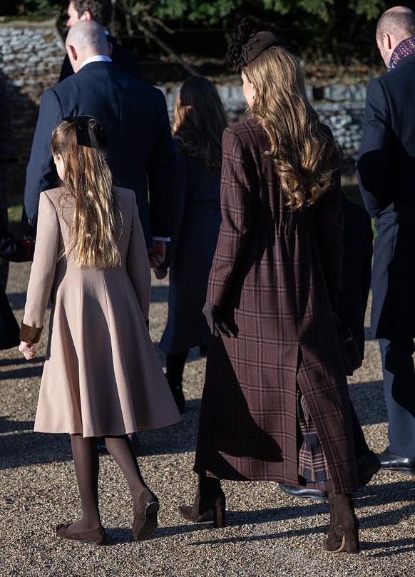 SANDRINGHAM, NORFOLK - DECEMBER 25: Catherine, Princess of Wales and Princess Charlotte of Wales attend the Christmas Morning Service at Sandringham Church on December 25, 2025 in Sandringham, Norfolk ...