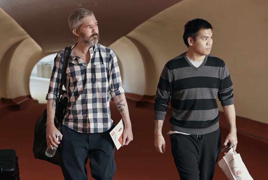 American&#039;s Andy Huynh, right, and Alex Drueke arrive at the TWA Hotel on Friday, Sept. 23, 2022 in New York. The two U.S. military veterans, who disappeared three months ago while fighting Russia ...