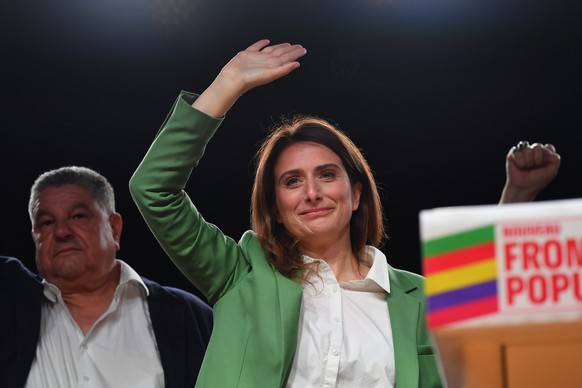 epa11449045 Marine Tondelier (EELV) gestures during the New Popular Front Rally after the first round of the early parliamentary elections at Place de la Republique in Paris, France, 30 June 2024. Acc ...