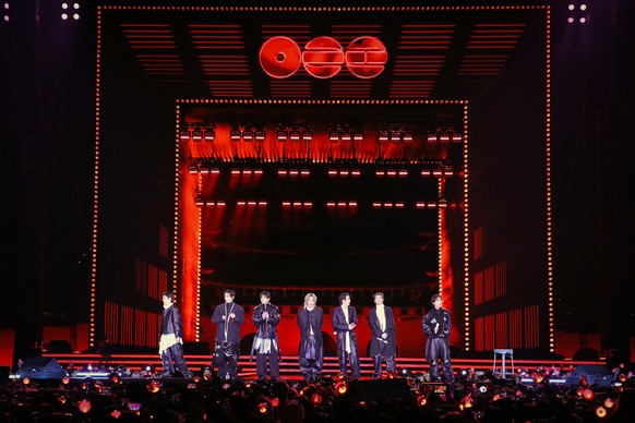epa12838532 A handout photo made available by BIGHIT MUSIC/Netflix shows K-pop group BTS performing during the 'BTS THE COMEBACK LIVE | ARIRANG' concert in central Seoul, South Korea, 21 Mar ...