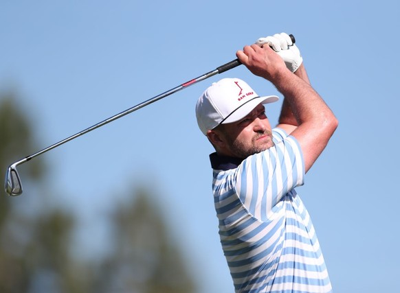 SOUTH LAKE TAHOE, NEVADA - JULY 11: Musician Justin Timberlake tees off from the first hole during the final round of the American Century Championship at Edgewood Tahoe South golf course on July 11,  ...