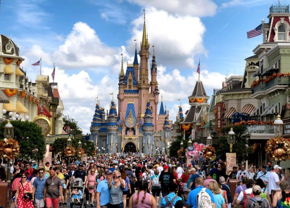 Crowds fill Main Street USA in front of Cinderella Castle at the Magic Kingdom on the 50th anniversary of Walt Disney World, in Lake Buena Vista, Fla., on Friday, Oct. 1, 2021. (Joe Burbank/Orlando Se ...