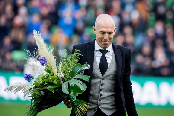 epa09569964 Retired soccer player Arjen Robben receives flowers prior the Dutch Eredivisie match between FC Groningen and RKC Waalwijk at the Euroborg stadium in Groningen, Netherlands, 07 November 20 ...