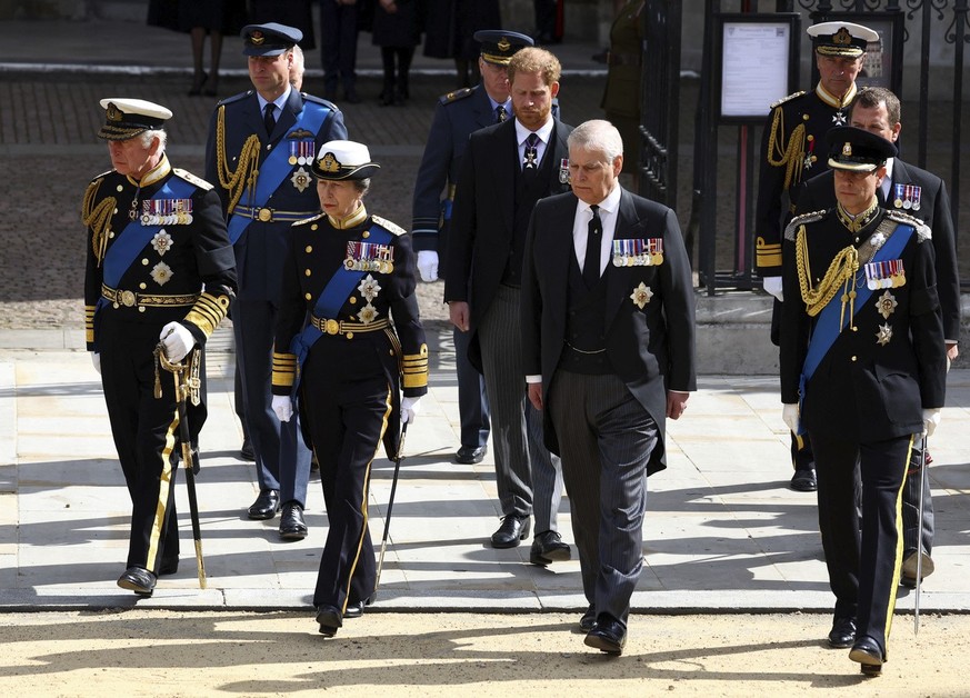 Britain&#039;s King Charles III, Princess Anne, Prince Andrew, Prince Edward, Prince William, Prince Harry, Peter Phillips and Timothy Laurence walk after a service at Westminster Abbey on the day of  ...