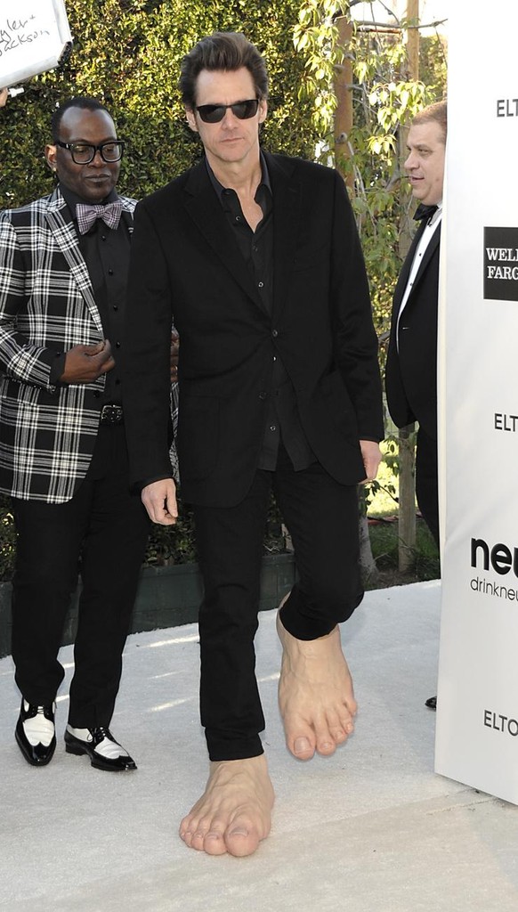 Actor Jim Carrey arrives at the 2013 Elton John Oscar Party in West Hollywood, Calif. on Sunday, Feb. 24, 2013. (Dan Steinberg/Invision/AP)