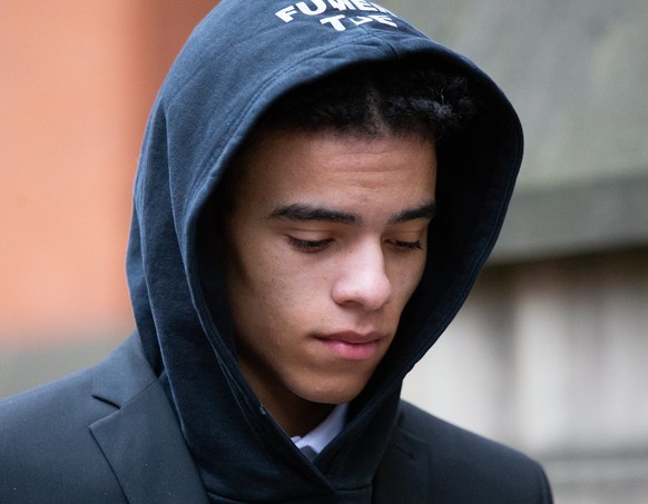 epa10317519 Manchester United footballer Mason Greenwood leaves Manchester Crown Court in Manchester, Britain, 21 November 2022. The player was re-bailed until next hearing session on 10 February 2023 ...