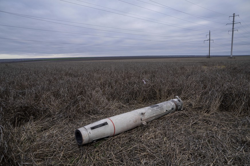 A rocket AGM-88B HARM lies in the field near Snigurivka, Ukraine, Sunday, Dec. 4, 2022. (AP Photo/Evgeniy Maloletka)