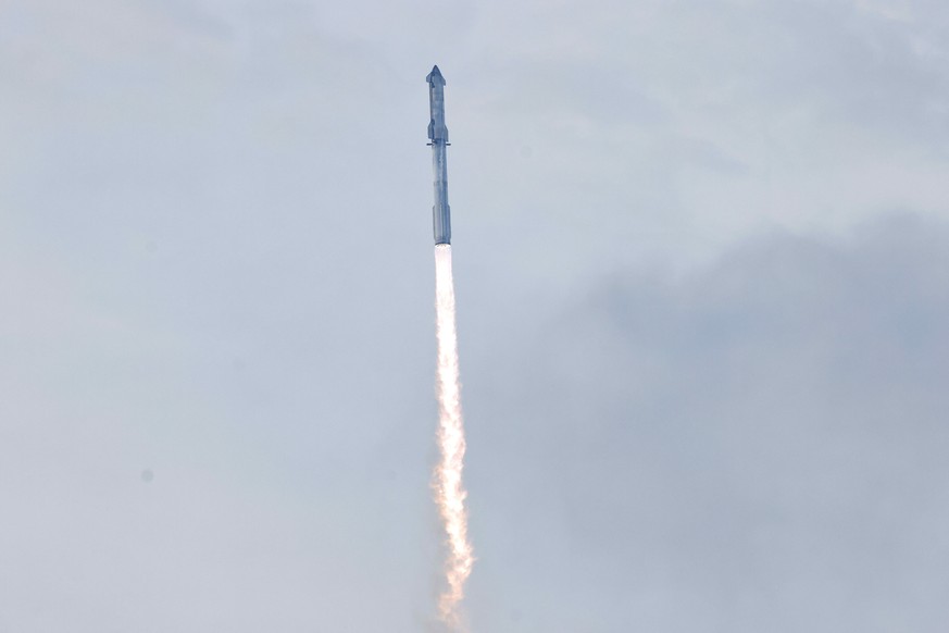 epa11220159 The mega rocket Starship launches in Boca Chica, Texas, USA, 14 March 2024. SpaceX has launched its mammoth Starship rocket from its base in Texas, with the third attempt appearing to be s ...