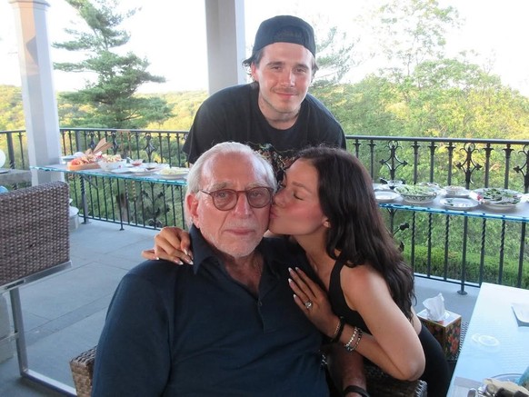 Nelson Peltz, sa fille Nicola et son beau-fils Brooklyn Beckham.