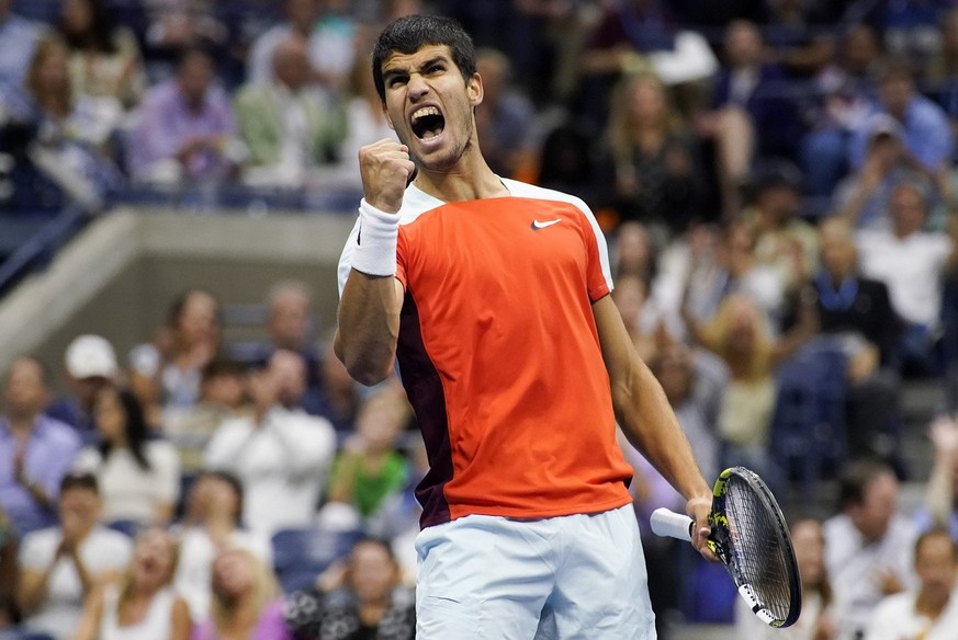 Carlos Alcaraz, of Spain, reacts after scoring a point against Casper Ruud, of Norway, during the men&#039;s singles final of the U.S. Open tennis championships, Sunday, Sept. 11, 2022, in New York. ( ...