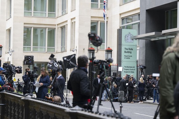 LONDON, UNITED KINGDOM - JUNE 5: Press members wait in front the Royal Courts of Justice building where the hearing of privacy and wiretapping case between son of King Charles III of England, Prince H ...