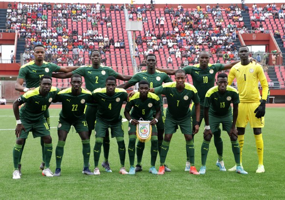epa10090391 Senegal national team pose during the African Nations Championship (CHAN) qualifier first leg match between Libera and Senegal, played at the Samuel Kayon Doe Sports Complex in Paynesville ...