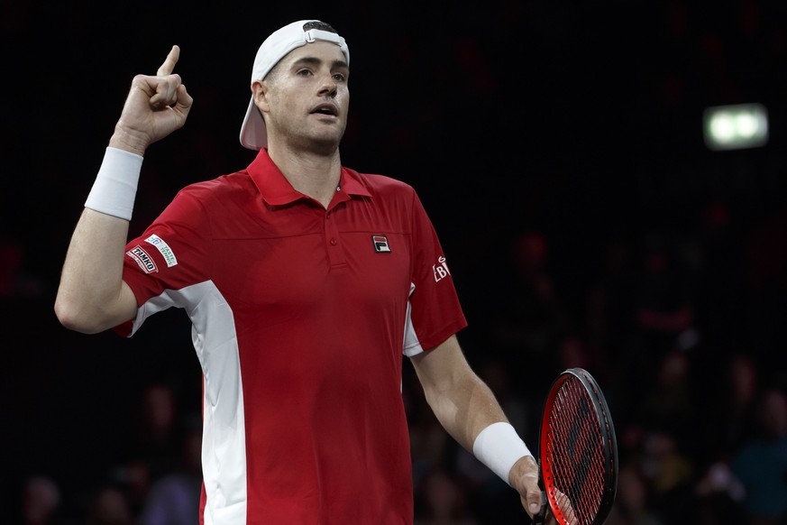 Team world&#039;s John Isner, reacts after winning a set against Team Europe&#039;s Alexander Zverev, during their single match, at the Laver Cup tennis event, in Geneva, Switzerland, Saturday, Septem ...