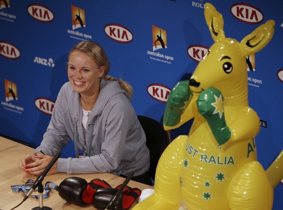 Denmark&#039;s Caroline Wozniacki addresses a press conference with an inflatable kangaroo next to her following her quarterfinal win over Italy&#039;s Francesca Schiavone at the Australian Open tenni ...