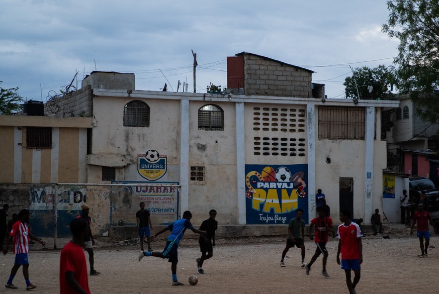 People play football in Delmas, Port-au-Prince, Haiti, on March 22, 2026. (Photo by Clarens SIFFROY / AFP)