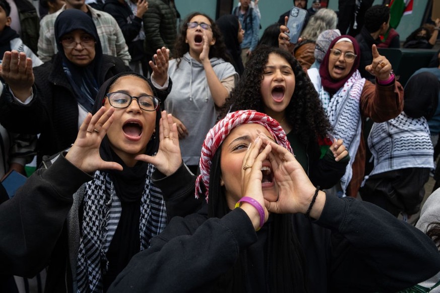 NEW YORK, NEW YORK - OCTOBER 8: People protest in support of the people of Palestine near the Israeli consulate on October 8, 2023 in New York City. On October 7, the Palestinian militant group Hamas  ...