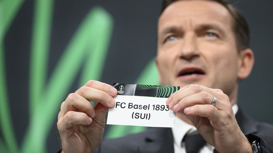 Czech former player and ambassador for the UEFA Europa Conference League final in Prague Vladimir Smicer shows a ticket of Switzerland&#039;s soccer club FC Basel 1893 during the UEFA Europa Conferenc ...
